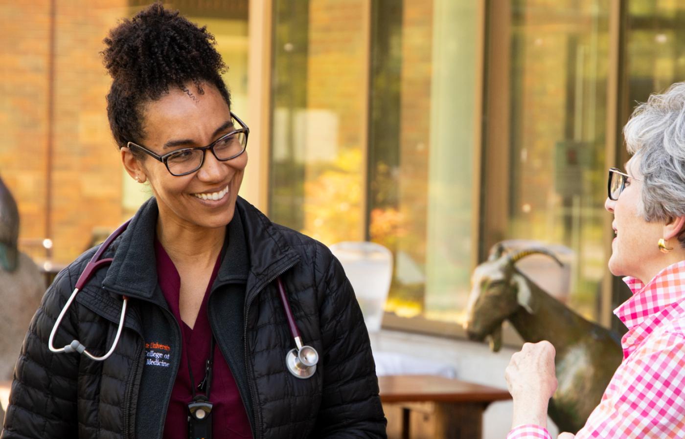Dr Ngwenyama and Rebecca Camden outside Carlson College of Veterinary Medicine