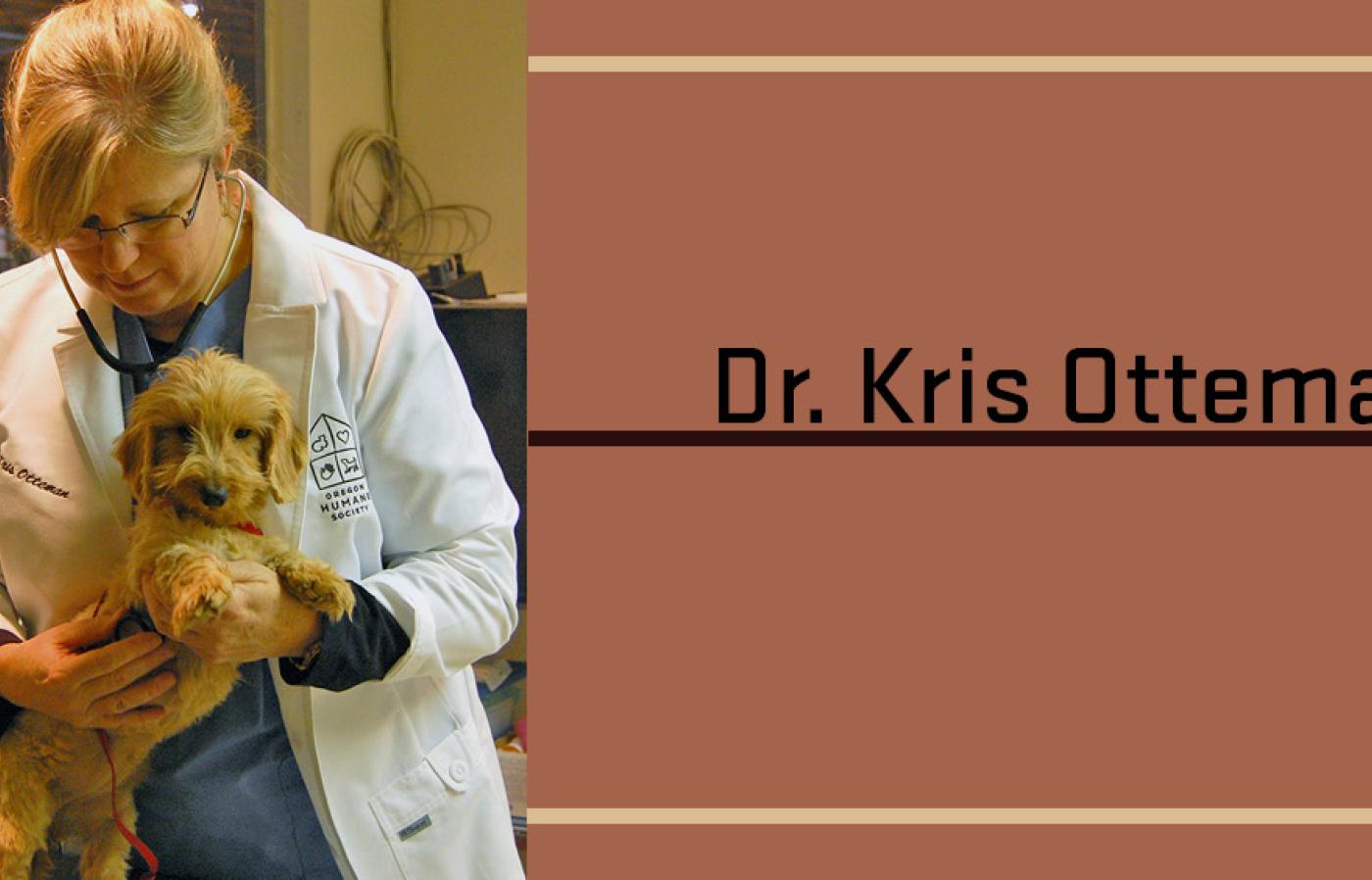 Dr Otteman listening to a pup's heartbeat