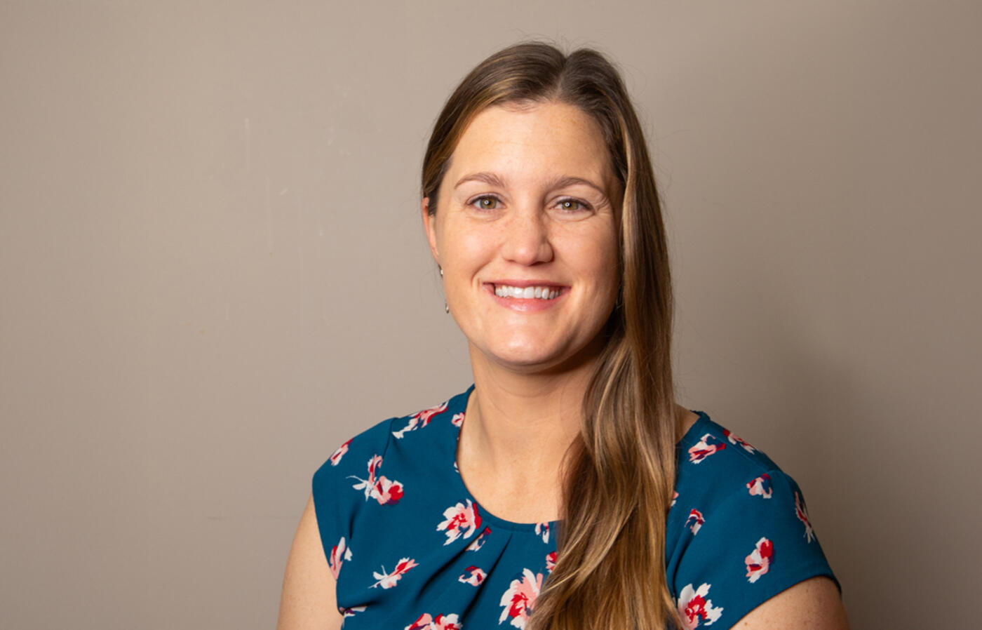 Portrait of smiling woman.