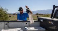 Matt Hutchinson prepares to set a mosquito trap in the Baker Valley.