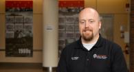 Dr. Marc Kinsley portrait in building atrium