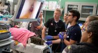 OSU Internal Medicine Resident Dr. Yanick Couture performs the endoscopic exam while Dr. Lewer watches.  