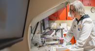 Technician works in clinical pathology laboratory.