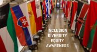 Image of flags from around the world in the Memorial Union with text saying: Inclusion Diversity Equity Awareness