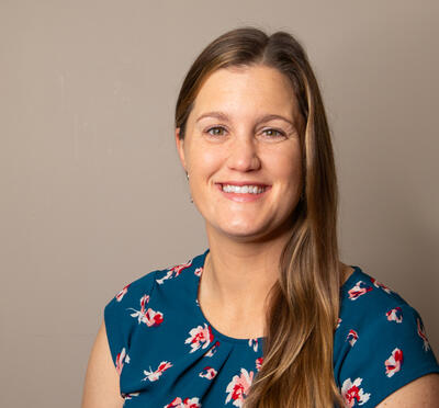 Portrait of smiling woman.