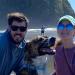 Two people and a dog on a beach at the Oregon Coast