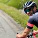 Duncan Russell riding bike in the mountains.