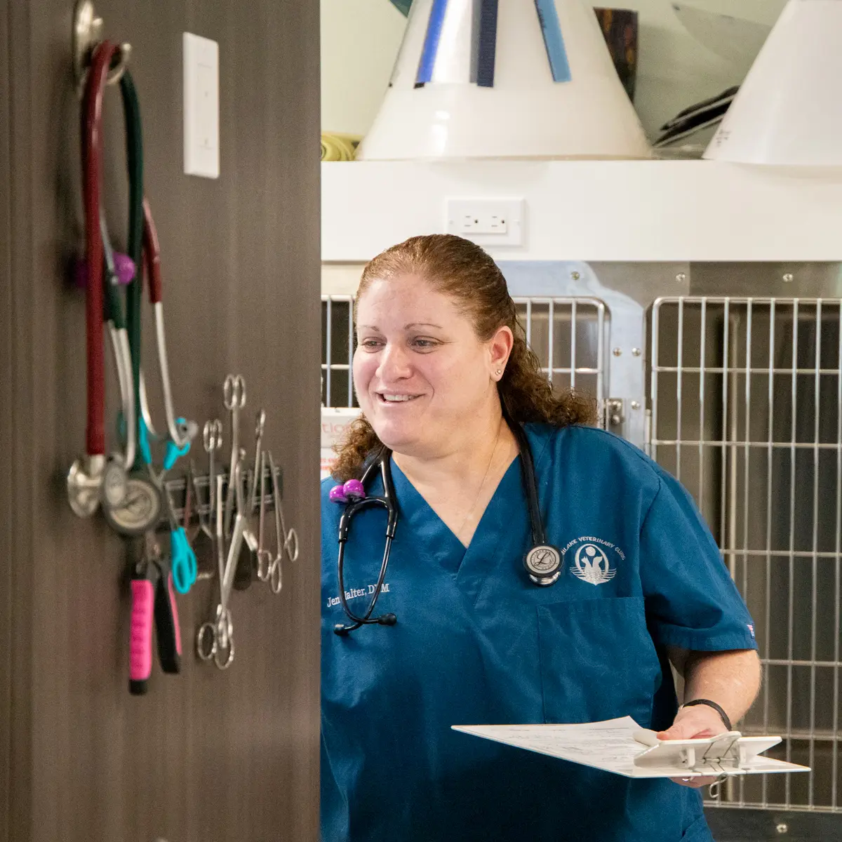 Veterinarian with clipboard in hand.