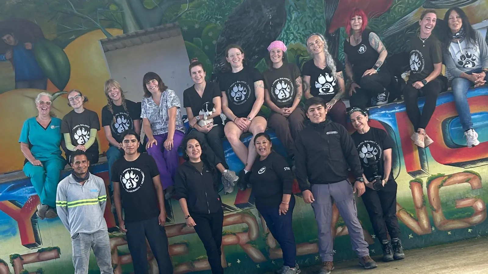 Group photo of veterinarian and veterinary staff.