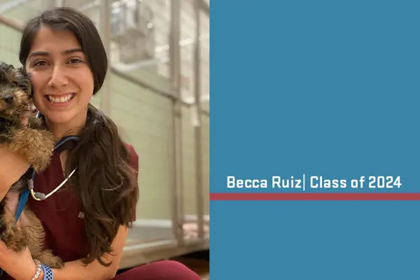 Becca Ruiz holding a small puppy