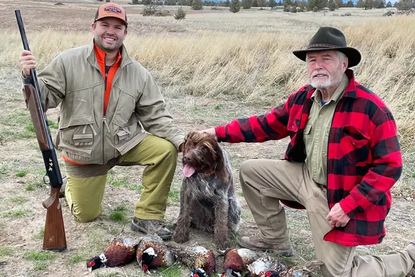 Jordan Beamer, Jax and Dr. Leland "Bud" Beamer on Jax's first hunt back after surgery. 
