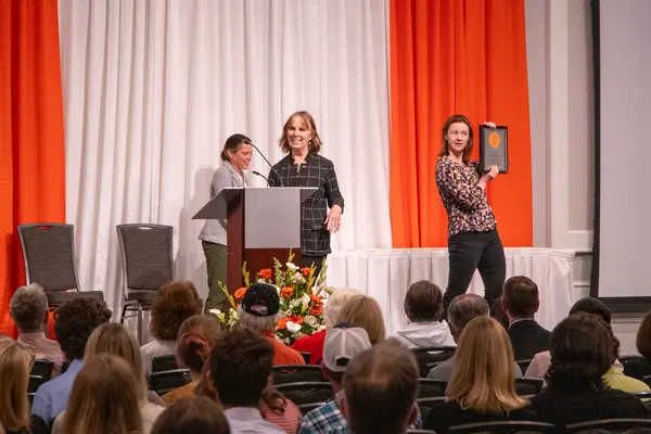 Dr. PK accepting an award