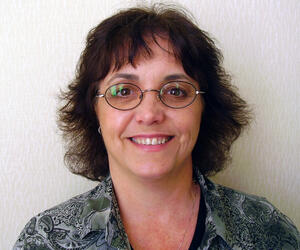 Smiling woman with glasses