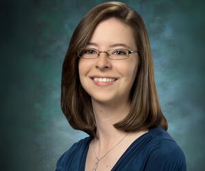 Smiling woman with glasses