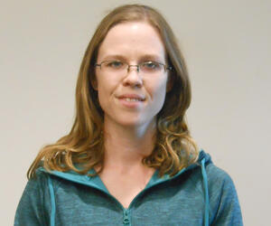 Smiling woman with glasses