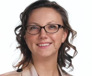 Smiling woman with glasses