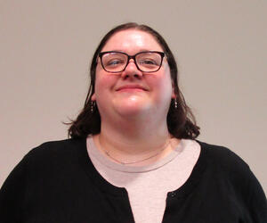 Smiling woman with glasses