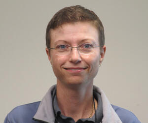 Woman smiling with glasses