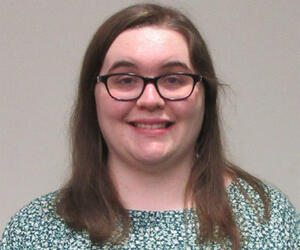 Smiling woman with glasses