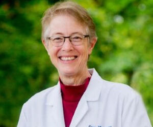 Smiling woman with glasses