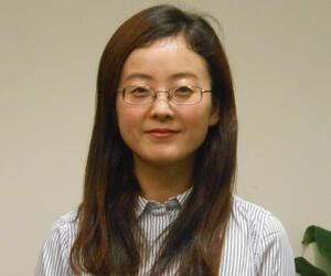 Smiling woman with glasses