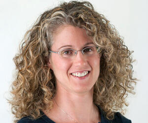 Smiling woman with glasses