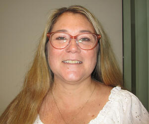 Smiling woman with glasses