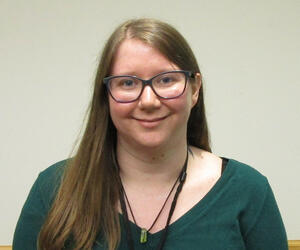 Smiling woman with glasses