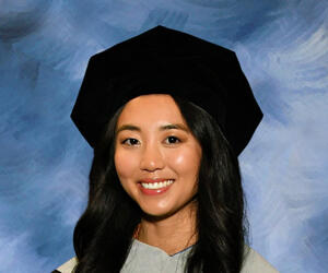 Dr. Nakamura formal graduation portrait in regalia.