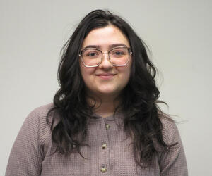 Portrait of person with white background. 