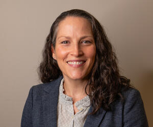 Portrait of smiling woman.